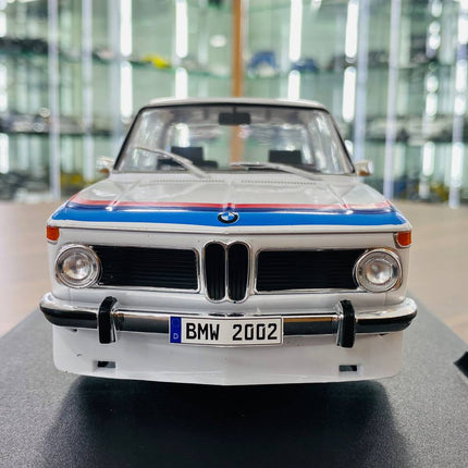 Solido BMW 2002 Tii 1/18 Diecast Model Car White Opening Doors - studio product photo of the scale model