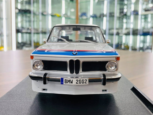 Solido BMW 2002 Tii 1/18 Diecast Model Car White Opening Doors - studio product photo of the scale model