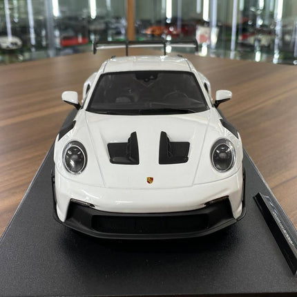 1/18 Diecast Porsche 911 (992) GT3 RS 2024 in White / blue by Solido - studio product photo of the scale model