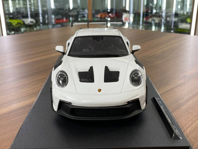 1/18 Diecast Porsche 911 (992) GT3 RS 2024 in White / blue by Solido - studio product photo of the scale model