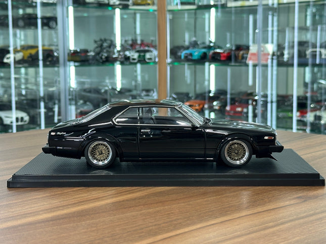 Ignition Model Nissan Skyline 2000 GT-ES C210 1/18 Resin Model Car Black - studio product photo of the scale model