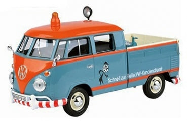 1:18 scale diecast VW pickup truck model, blue and orange, with roof siren and vintage detailing