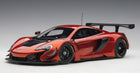 Red diecast model race car in 1:18 scale with detailed aerodynamic body and rear wing