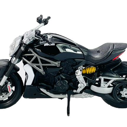 1:18 scale diecast model of black Ducati motorcycle with detailed frame and yellow suspension
