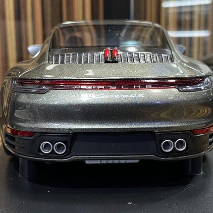 Minichamps Porsche 911 Carrera 4S 2019 1:18 Grey Metallic Resin Model - studio product photo of the scale model