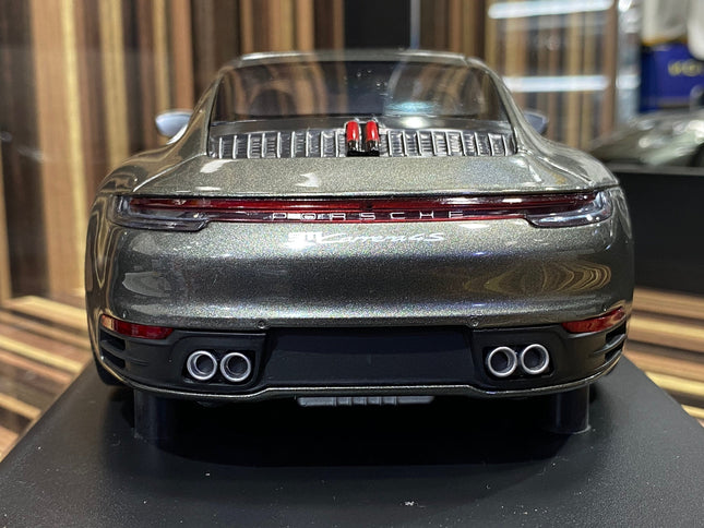 Minichamps Porsche 911 Carrera 4S 2019 1:18 Grey Metallic Resin Model - studio product photo of the scale model