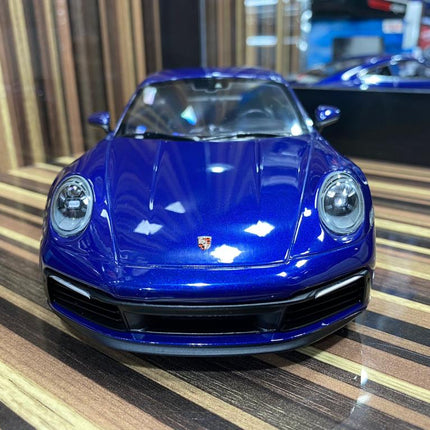 Minichamps Porsche 911 Carrera 4S 2019 1:18 Resin Model Blue - studio product photo of the scale model