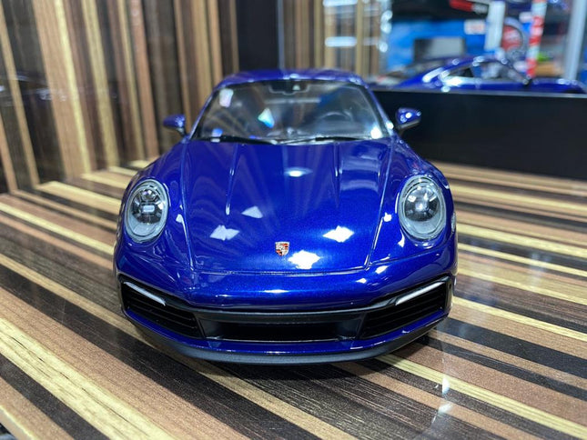 Minichamps Porsche 911 Carrera 4S 2019 1:18 Resin Model Blue - studio product photo of the scale model