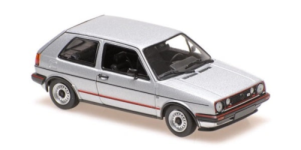 1:18 scale silver diecast model car, classic hatchback with red trim, detailed wheels