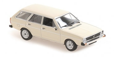 1:18 scale diecast cream classic station wagon model car with silver trim, left side view
