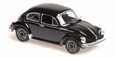 Black diecast Volkswagen Beetle model car in 1:18 scale with silver detailing