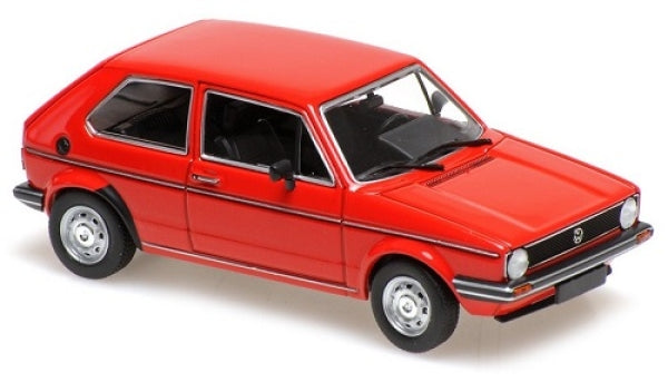 Red diecast model car, classic hatchback in 1:18 scale, detailed exterior, isolated view