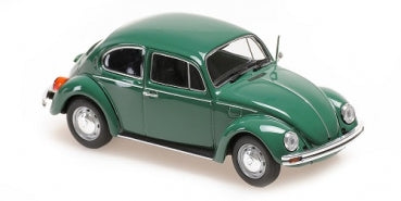 Green diecast Volkswagen Beetle scale model car on white background