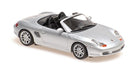 Silver 1:18 scale diecast Porsche convertible model car with detailed wheels and interior