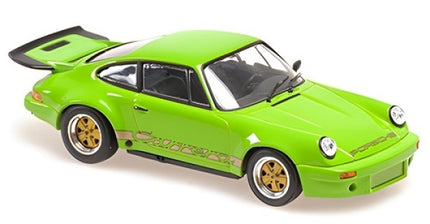 Green diecast Porsche model car 1:18 scale with gold wheels and rear spoiler