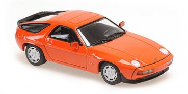 1:18 scale orange diecast model car with black accents, classic coupe design, detailed wheels