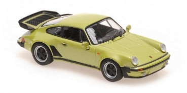 1:18 scale diecast model of classic green Porsche sports car with open rear engine cover