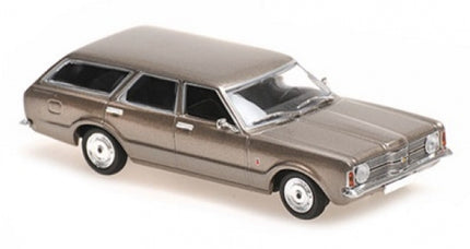 1:43 scale diecast model of a classic brown station wagon car, angled front view