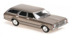 1:43 scale diecast model of a classic brown station wagon car, angled front view