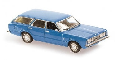 Blue diecast model station wagon car with chrome trim, 1:18 or 1:24 scale.