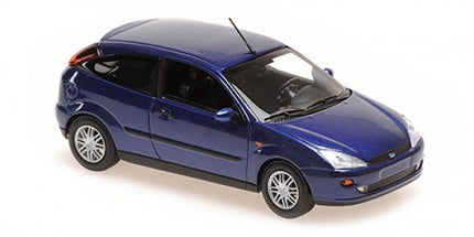 Blue diecast model car in 1:18 scale, compact hatchback with detailed features on white background