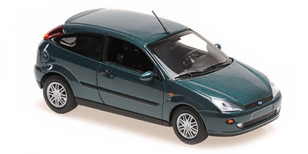 1:18 scale diecast model car in metallic green, three-door hatchback, detailed wheels