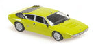 Lime green diecast model car in 1:18 scale, classic sports car with detailed features