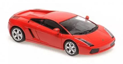 Red diecast model car in 1:18 scale, sleek sports car with silver wheels on white background