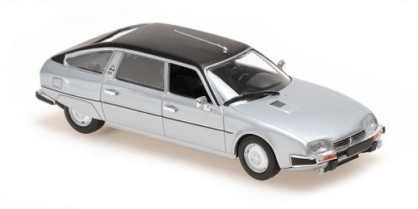 1:18 scale silver diecast model car with black roof, luxury vintage collectible