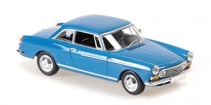Blue 1:18 scale diecast model classic car with chrome detailing on white background