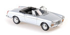 silver diecast convertible model car with black interior, 1:18 scale, classic design