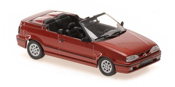 Red diecast convertible model car with black interior, 1:18 scale, on white background.