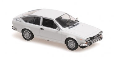 White diecast model car in 1:18 scale with detailed wheels and classic coupe design