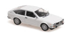 White diecast model car coupe with detailed wheels and interior, 1:18 scale