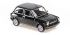 1:24 scale black diecast model car with silver wheels, classic compact design
