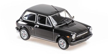 Black 1:18 scale diecast model car, classic compact design, detailed exterior