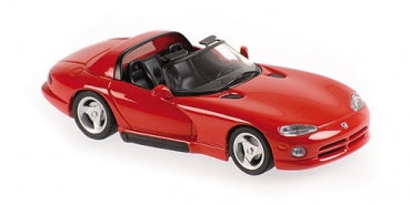 1:18 scale red diecast convertible sports model car with black interior on white background