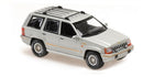 Silver diecast SUV model car in 1:43 scale with detailed roof rack and wheels