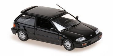 1:18 scale black diecast model car hatchback with detailed wheels and rear spoiler