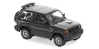 1:18 scale diecast Mitsubishi Pajero model car in black with detailed exterior