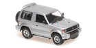 1:43 scale silver diecast Mitsubishi Pajero SUV model car, detailed exterior