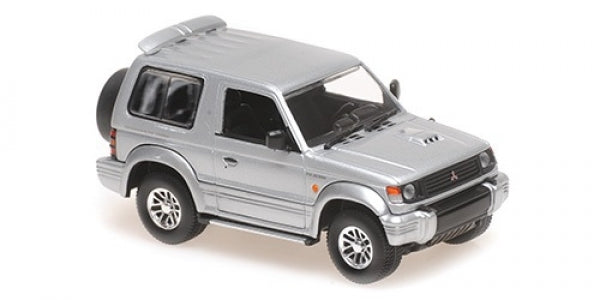 1:43 scale silver diecast Mitsubishi Pajero SUV model car, detailed exterior