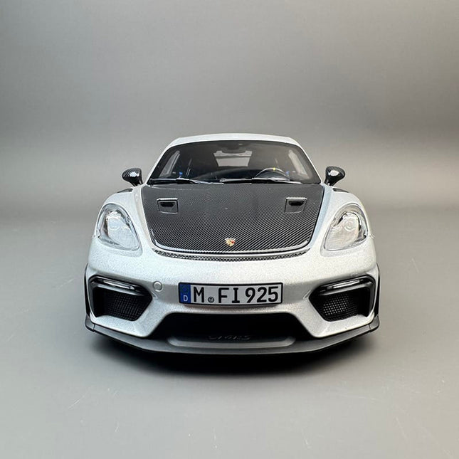 Norev Porsche 911 GT4 RS Silver 1:18 Diecast Model Car - studio product photo of the scale model