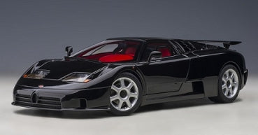 Black diecast sports car model with red interior, 1:18 scale, detailed exterior design.