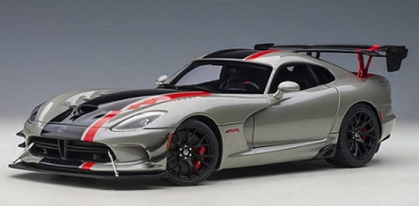 1:18 scale diecast model car, silver sports car with black and red stripes, large rear wing