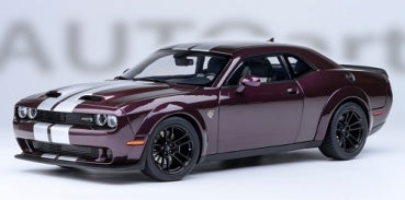 1:18 scale burgundy diecast model car with black wheels and white racing stripes