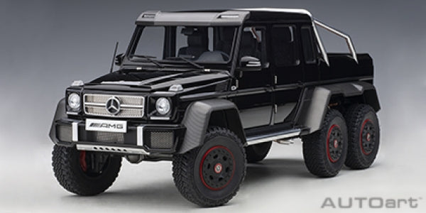Black diecast Mercedes-Benz G63 AMG 6x6 model car, 1:18 scale, off-road design, detailed interior