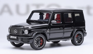 1:18 scale black Mercedes G-Class AMG diecast model car with red interior, detailed wheels