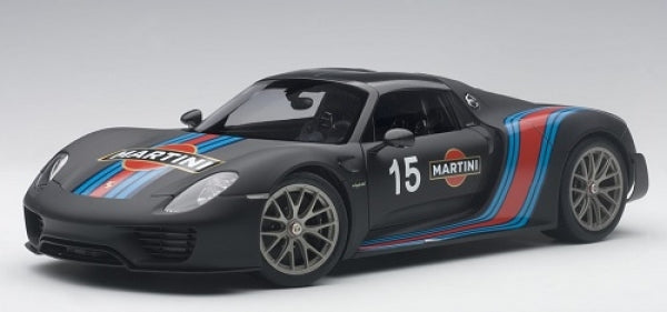 Diecast model Porsche sports car with Martini livery, black matte finish, number 15.