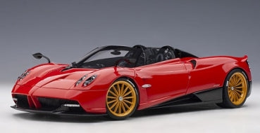 Red diecast model sports car with gold wheels, convertible, 1:18 scale, detailed exterior